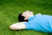 3440589-young-man-lying-on-the-grass